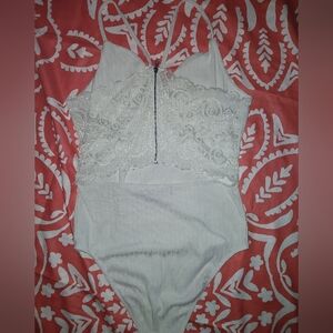 Elegant White Lace Bodysuit
